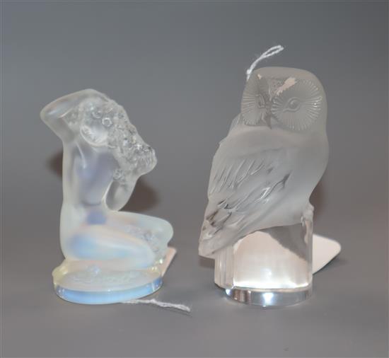 A Lalique frosted glass owl mascot and another of a kneeling nude woman, H 8.5cm (tallest)